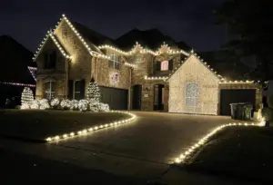 warm white holiday lights installed on customers house